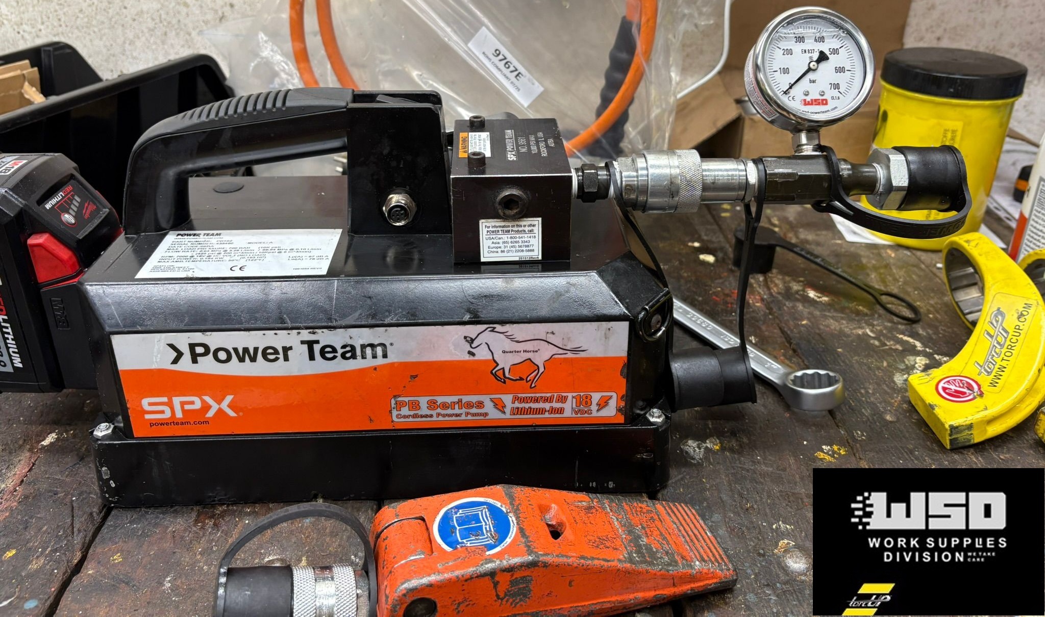Power Team PB102 battery hydraulic pump with pressure gauge at WSD